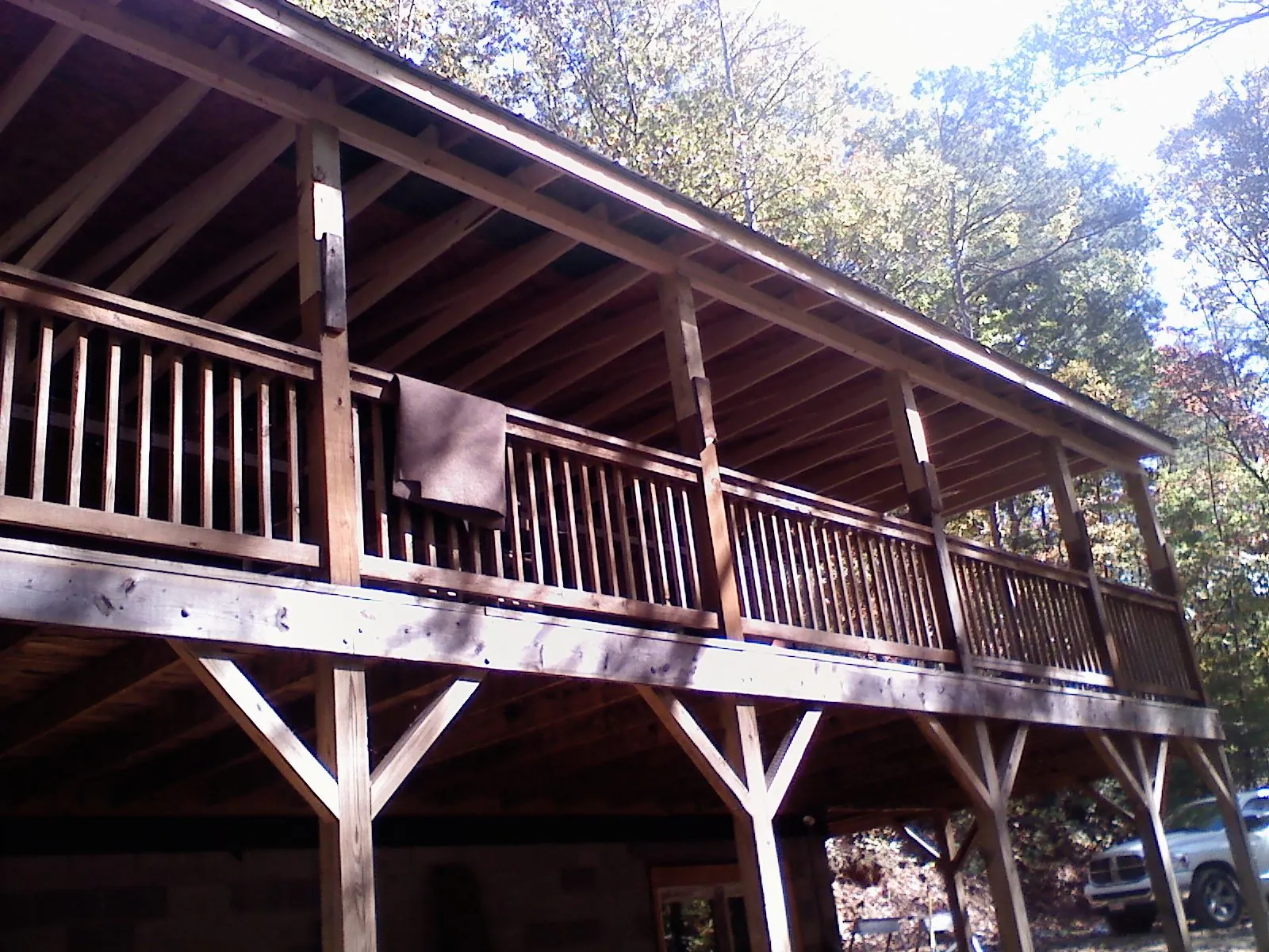 Timber framing under a new elevated porch and deck — Roof Leak Repair in Indianola by Roofing Brothers